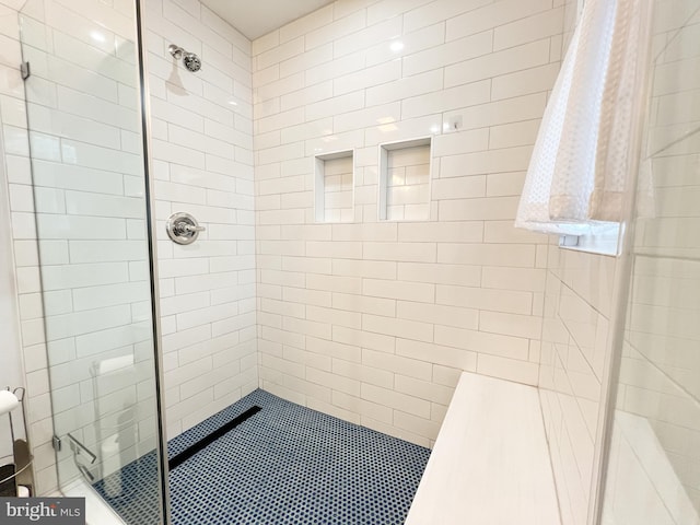 full bath featuring a stall shower