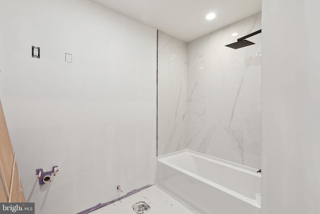 bathroom with shower / tub combination