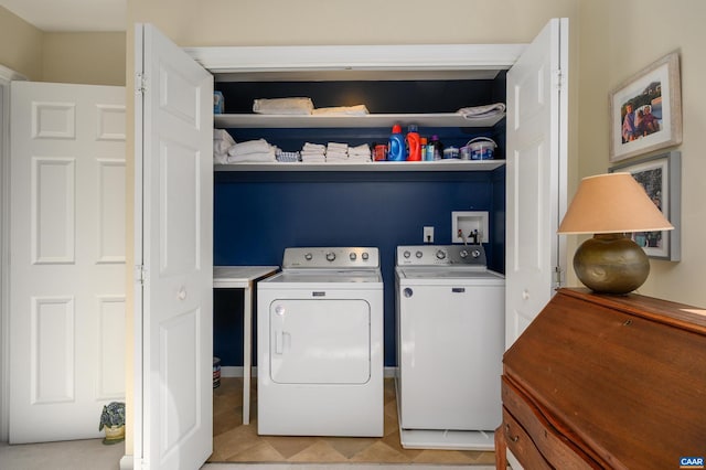 laundry room featuring washer and dryer and laundry area