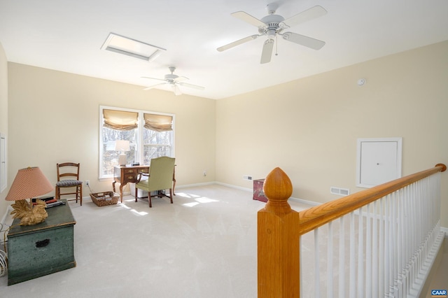 office area with attic access, baseboards, visible vents, and carpet flooring