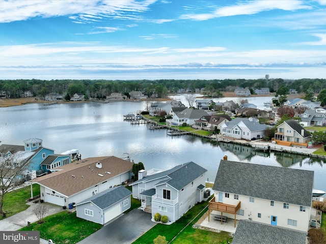 aerial view featuring a residential view and a water view