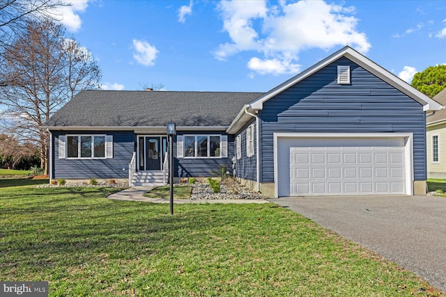 single story home featuring a garage, a front yard, driveway, and a shingled roof