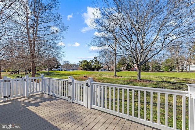 deck featuring a lawn