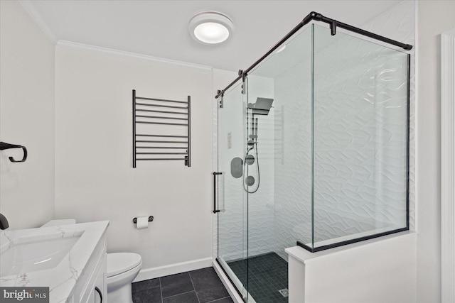 bathroom featuring ornamental molding, a stall shower, toilet, and tile patterned floors