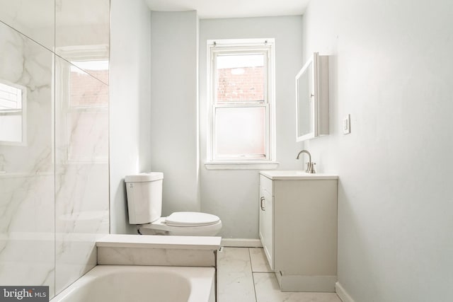 5717 Addison St, Philadelphia, PA 19143 - full bath featuring toilet, vanity, marble finish floors, a tub to relax in, and baseboards