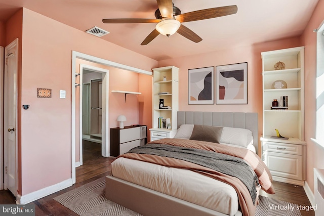 bedroom featuring ceiling fan, dark wood-style flooring, visible vents, and baseboards