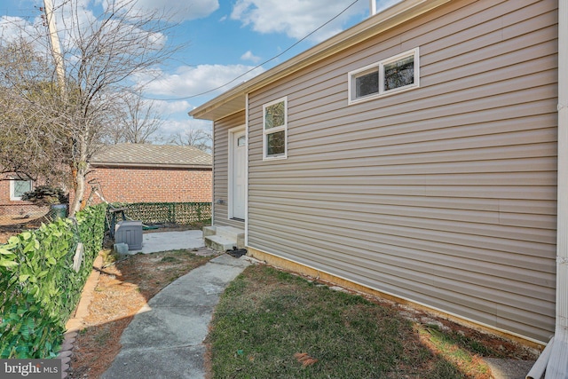 view of home's exterior with entry steps