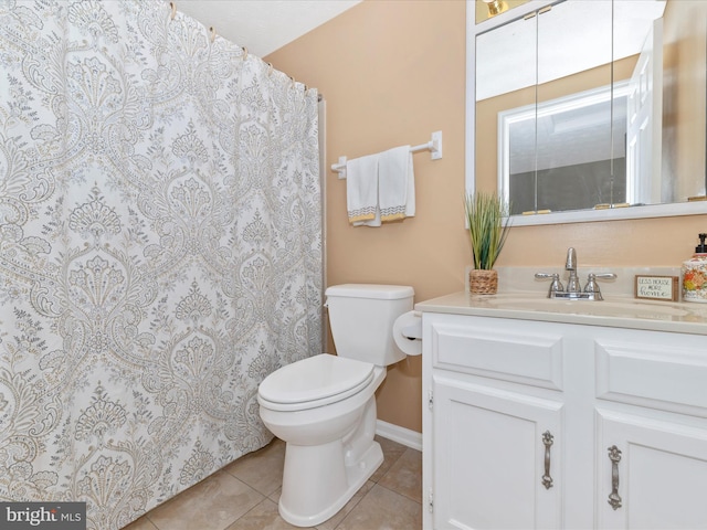 full bathroom with baseboards, a shower with shower curtain, toilet, tile patterned flooring, and vanity