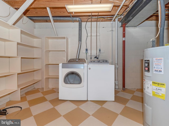 laundry area with laundry area, light floors, independent washer and dryer, and electric water heater