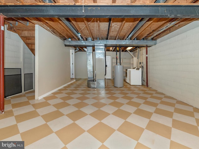 unfinished below grade area featuring water heater, light floors, concrete block wall, and heating unit