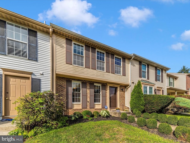 multi unit property with brick siding