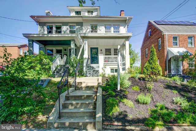 traditional style home with a porch, a chimney, and stucco siding