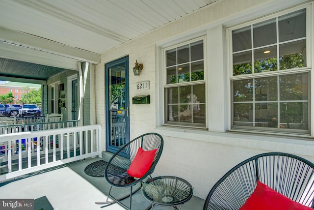 view of patio featuring a porch