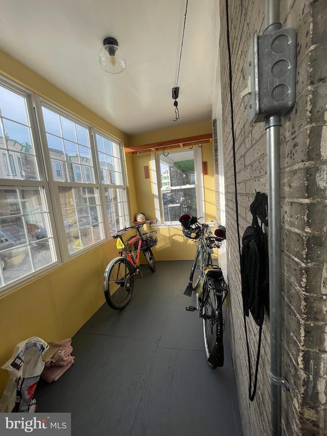 exercise area with brick wall