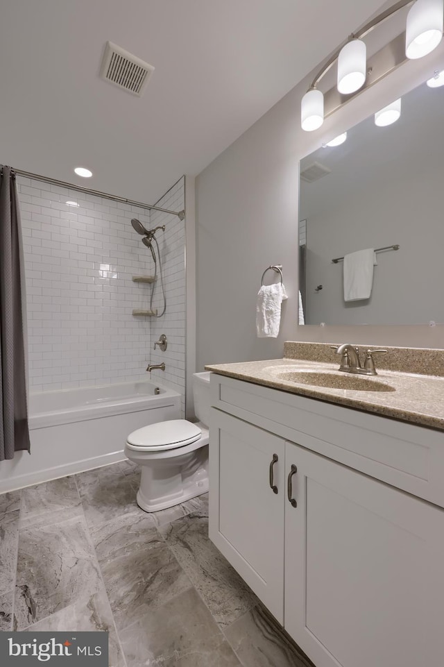 full bathroom with shower / bathing tub combination, visible vents, toilet, and vanity