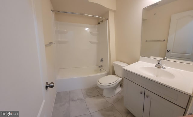 bathroom with toilet, tile patterned floors, tub / shower combination, and vanity