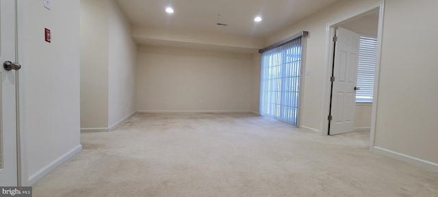 unfurnished room featuring recessed lighting, carpet flooring, and baseboards