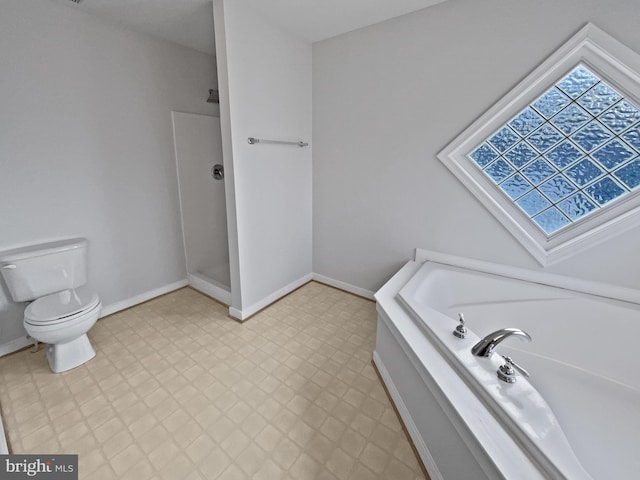 bathroom with a shower, toilet, a bath, baseboards, and tile patterned floors