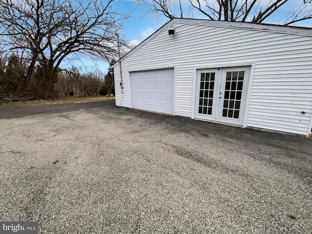 garage with driveway