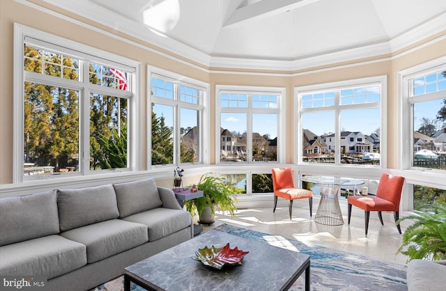 sunroom with lofted ceiling