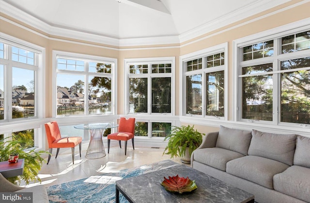 sunroom / solarium with lofted ceiling