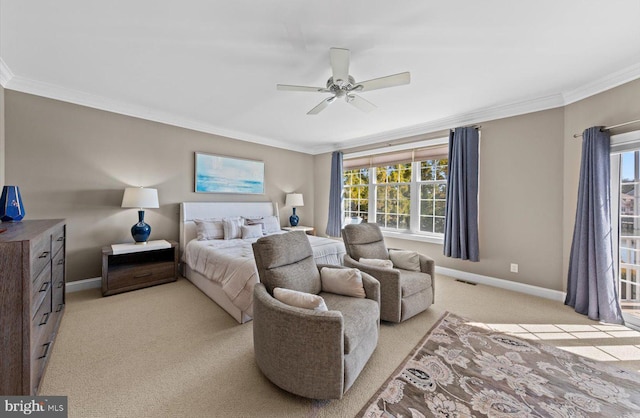 bedroom featuring visible vents, multiple windows, light colored carpet, and crown molding