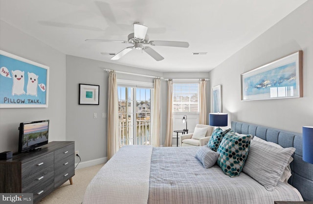 bedroom with a ceiling fan, visible vents, baseboards, access to outside, and light colored carpet