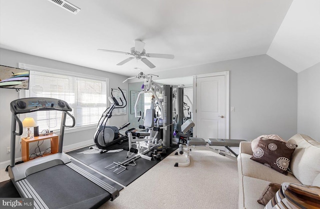 workout room with vaulted ceiling, a ceiling fan, visible vents, and baseboards