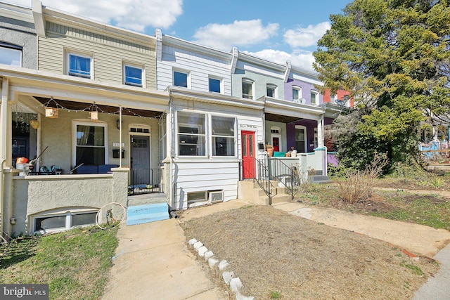 multi unit property featuring covered porch