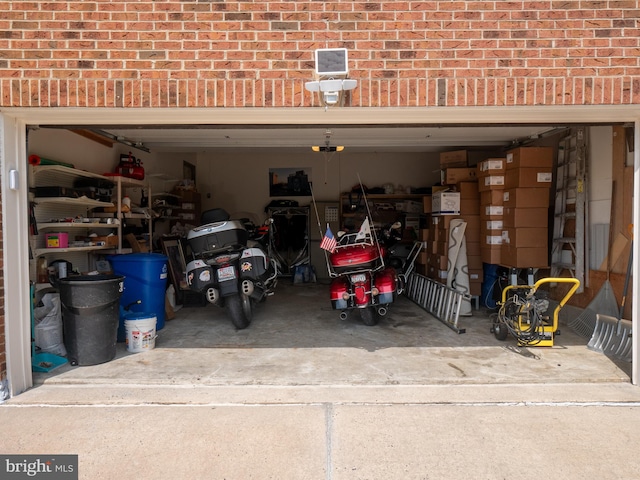 garage featuring driveway