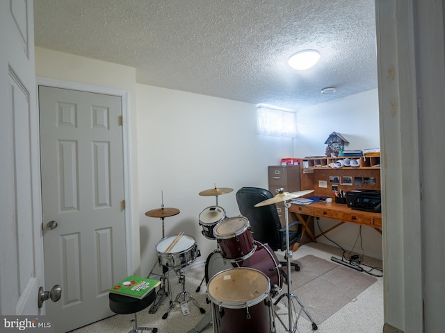 office area featuring a textured ceiling