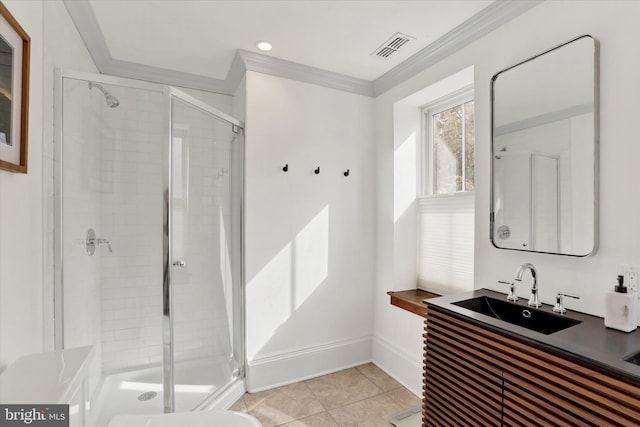 bathroom with visible vents, baseboards, ornamental molding, a shower stall, and tile patterned floors