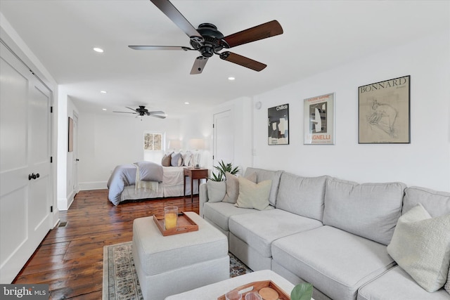 living room with baseboards, ceiling fan, dark wood-type flooring, and recessed lighting