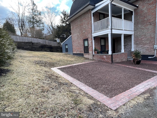 exterior space with a balcony