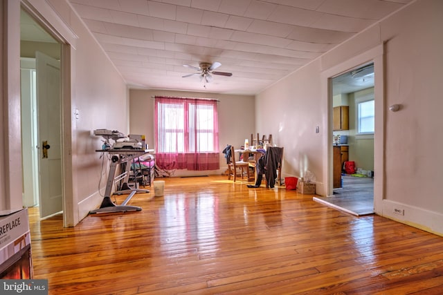 interior space featuring ceiling fan and hardwood / wood-style flooring