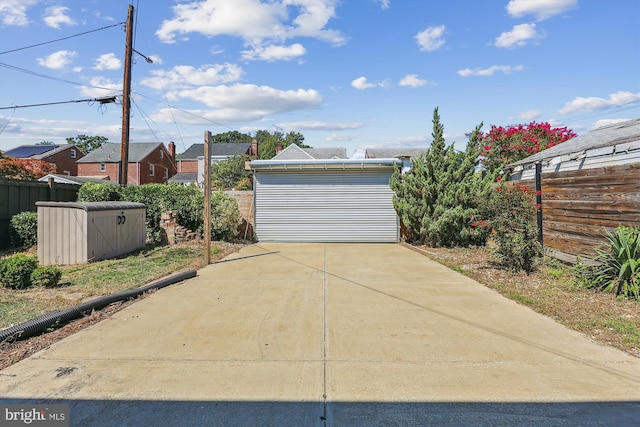 garage with fence