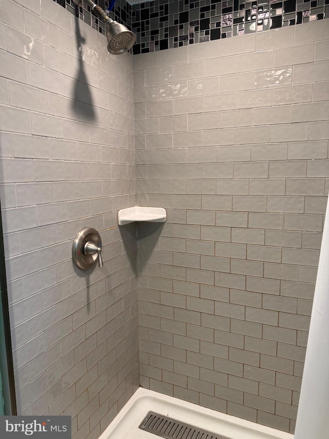 bathroom with a stall shower