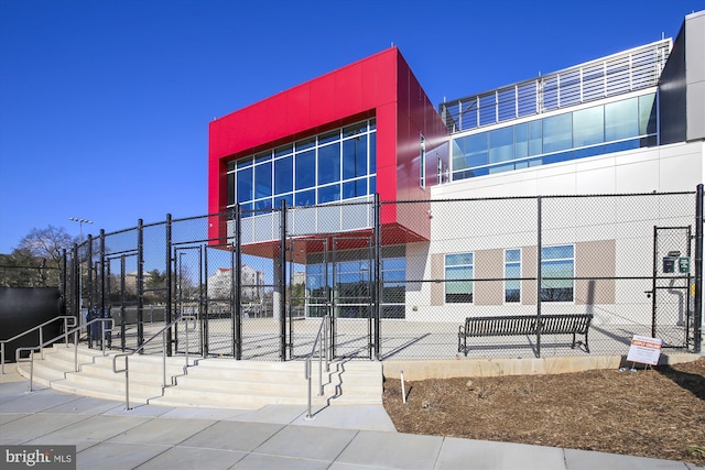 view of property with fence