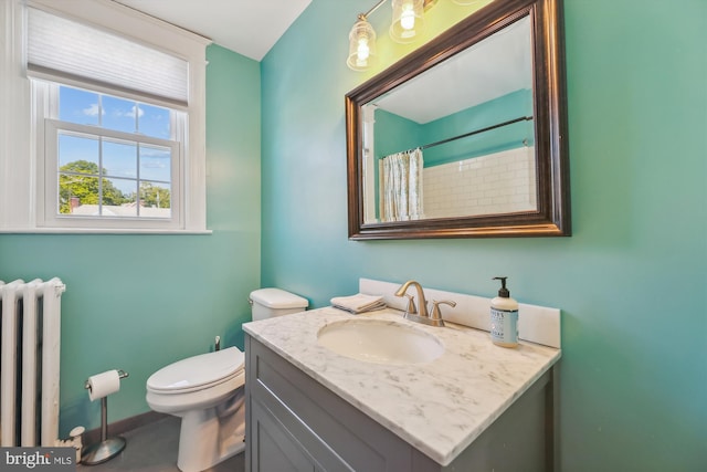 full bathroom featuring a shower with shower curtain, vanity, toilet, and radiator