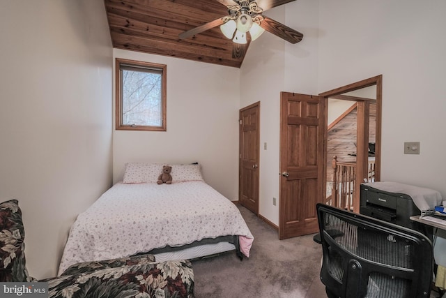 bedroom featuring a ceiling fan, wood ceiling, carpet, and high vaulted ceiling