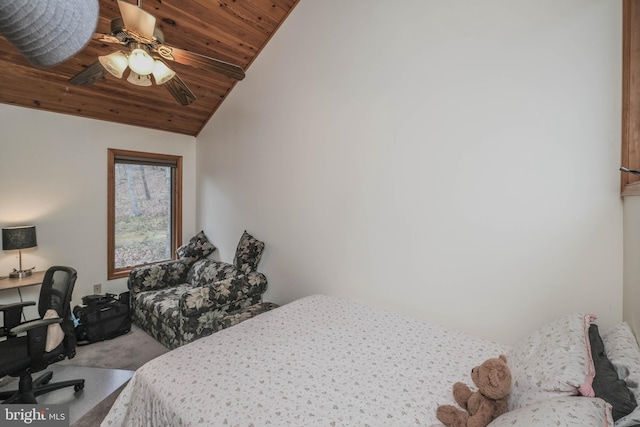 carpeted bedroom with a ceiling fan, vaulted ceiling, and wood ceiling