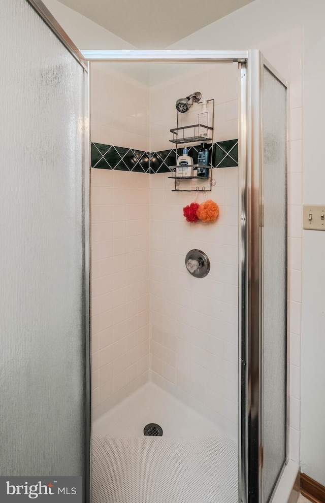 bathroom featuring a stall shower