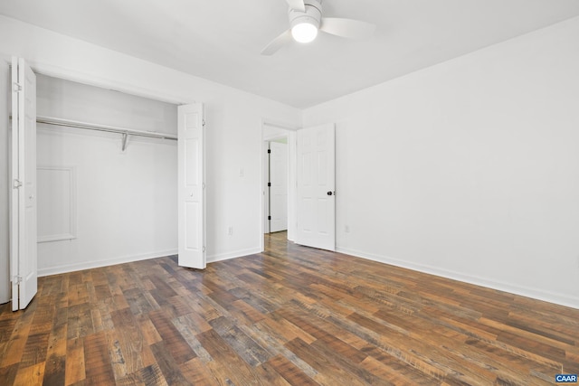 unfurnished bedroom with ceiling fan, a closet, wood finished floors, and baseboards