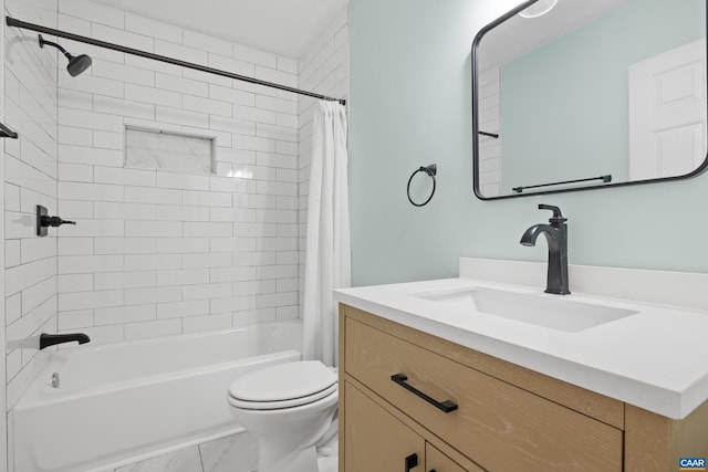 full bathroom with shower / bath combo, vanity, and toilet