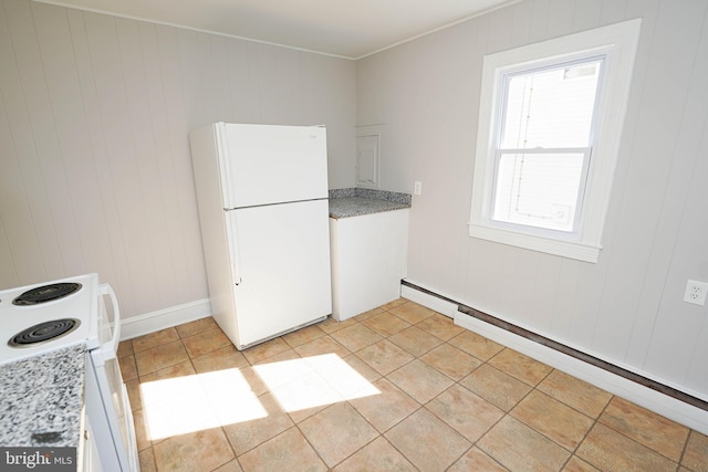 kitchen with light countertops, white appliances, light tile patterned flooring, and baseboard heating