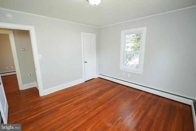 unfurnished room featuring ornamental molding, a baseboard radiator, baseboards, and wood finished floors