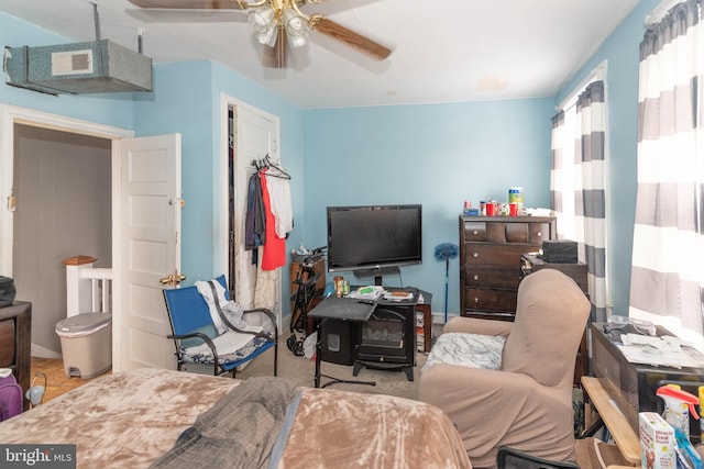 bedroom featuring ceiling fan