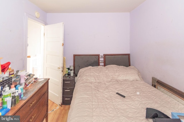 bedroom with light wood-style flooring