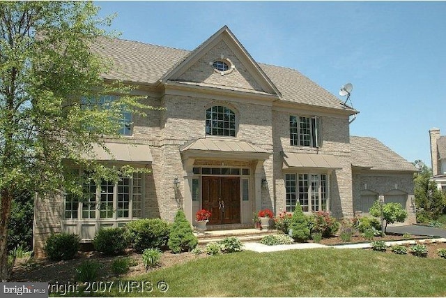 view of front of property with an attached garage