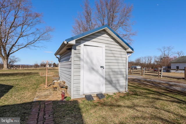 view of shed with fence